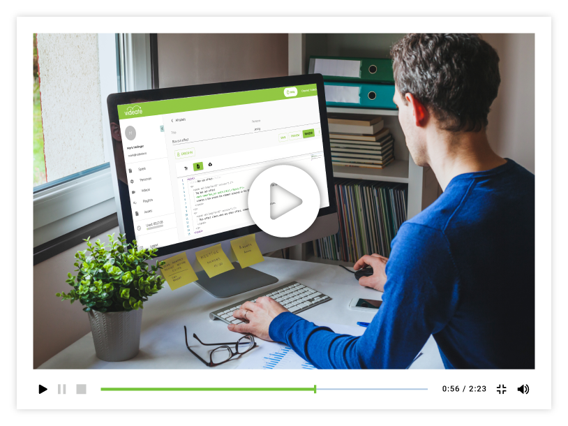 Screenshot of an instruction video with a man using a software on his desktop computer
